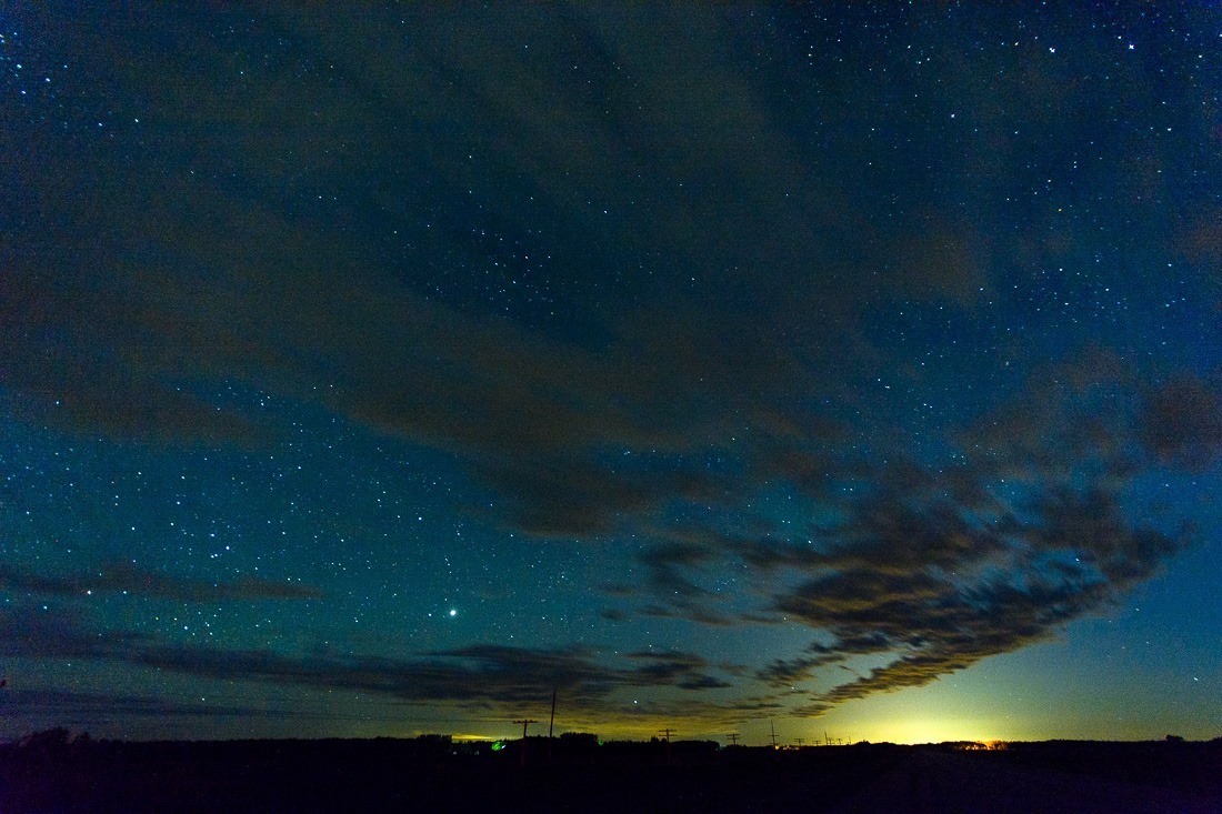 Looking west, waiting for the clouds to move out